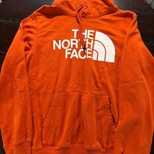 The North Face Orange Pullover Hoodie with White Logo